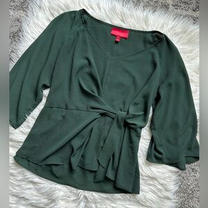 Jennifer Lopez bell sleeve blouse